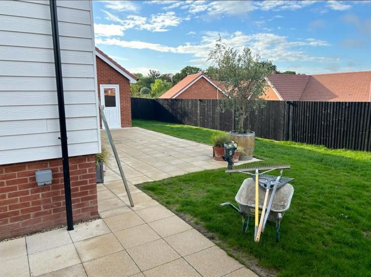 Patio and lawn with fencing to the garden boundary